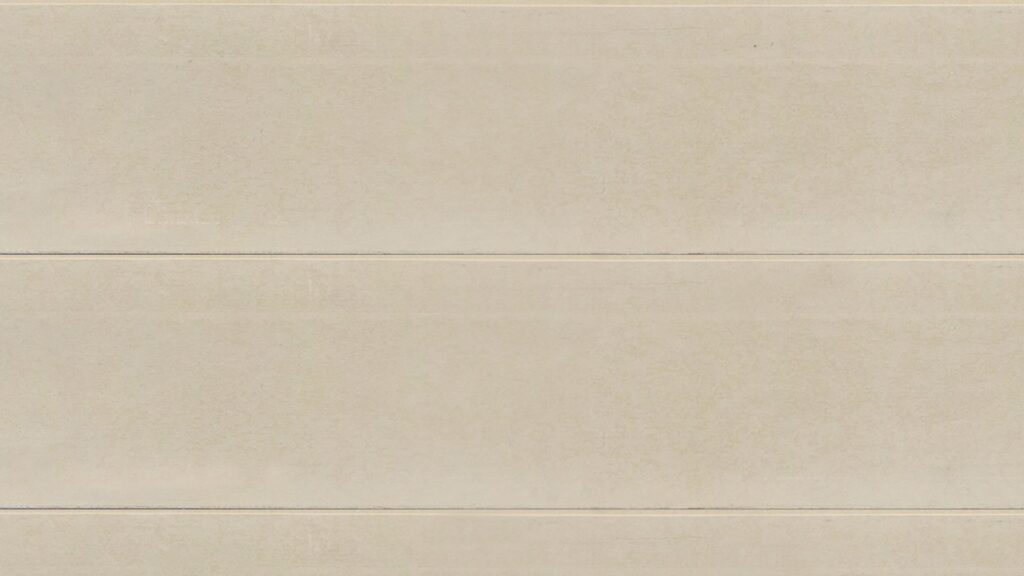 A beige wall with two horizontal lines, creating the appearance of large rectangular panels stacked on top of each other. The surface has a smooth, matte finish.